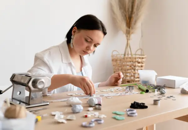 female-artisan-working-with-clay-atelier